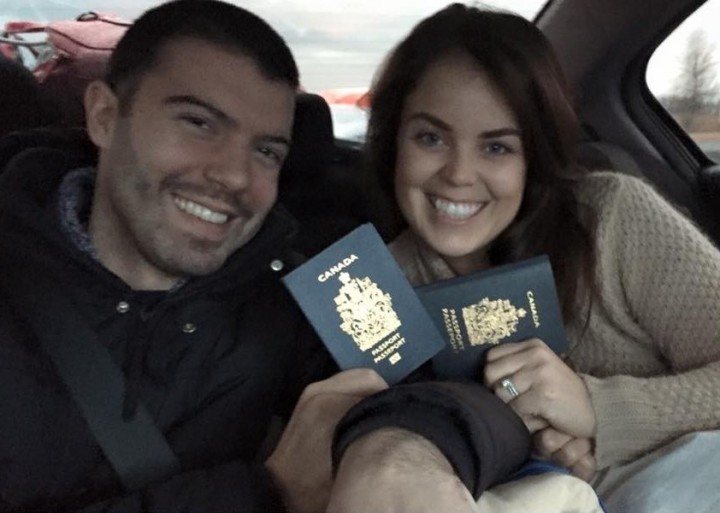 Matthew Schreindorfer and Katia Luciani flash their passports as they head to Maryland for an experimental cancer treatment, Tuesday, March 15, 2016.