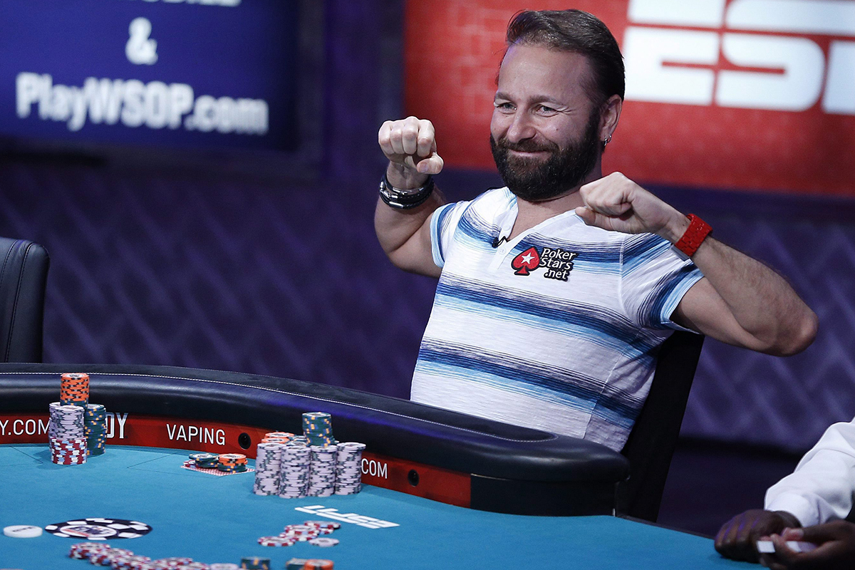Daniel Negreanu stretches while playing at the World Series of Poker main event Tuesday, July 14, 2015, in Las Vegas. 