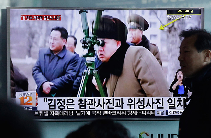 A man passes by a TV screen showing North Korean leader Kim Jong Un during a news program at Seoul Railway Station in Seoul, South Korea, Thursday, March 24, 2016. 