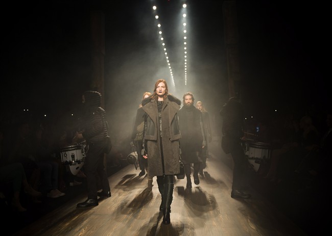 Models walk the runway for the Rudsak collection during Toronto Fashion Week in Toronto on Thursday, March 17, 2016. 