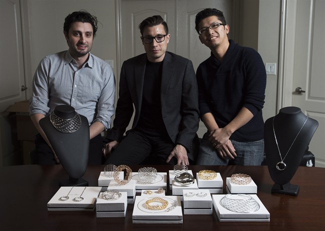 Luca Daniel Lavorato, left to right, Mario Christian Lavorato and Heng Tang of the jewelry company Daniel Christian Tang pose for a photograph at their office, in Toronto on March 1, 2016. 