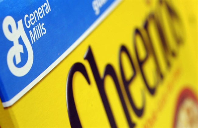 In this Dec. 15, 2007 file photo, a box of General Mills' Cheerios is seen on a shelf at a Shaw's Supermarket in Gloucester, Mass.