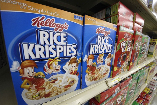 In a July 18, 2012, file photo, Kellogg's cereals are on display at a Pittsburgh grocery market. Kellogg says a criminal investigation is underway after a video surfaced online showing a man urinating on one of its factory assembly lines.