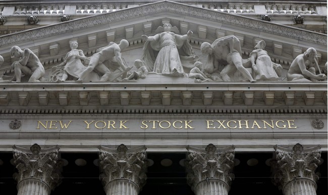 This Oct. 4, 2014, file photo, shows the facade of the New York Stock Exchange. Stocks are off to a mixed start Monday, March 21, 2016.