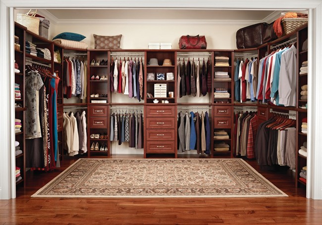This closet organization system  offers a built-in appearance, but can be removed to be used elsewhere if the homeowner’s needs change. 