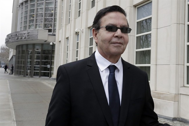 Former Honduran President Rafael Callejas leaves federal court in New York, Monday, March 28, 2016. Calleja has pleaded guilty to conspiracy charges in a wide-ranging FIFA soccer scandal.