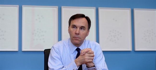 Minister of Finance Bill Morneau takes part in an interview at Finace Headquaters in Ottawa on Thursday, March 24, 2016. 
