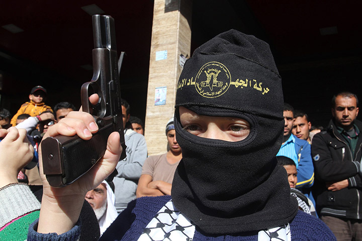Palestinian Islamic Jihad militants take part in an anti-Israel rally
Anti-Israel rally in the town of Rafah in the southern Gaza Strip, Palestinian Territories on Dec. 18, 2015.