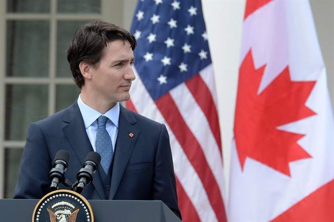 Prime Minister Justin Trudeau looks over at U.S. President Barack Obama during a joint news conference in the Rose Garden at the White House in Washington, D.C. on Thursday, March 10, 2016.