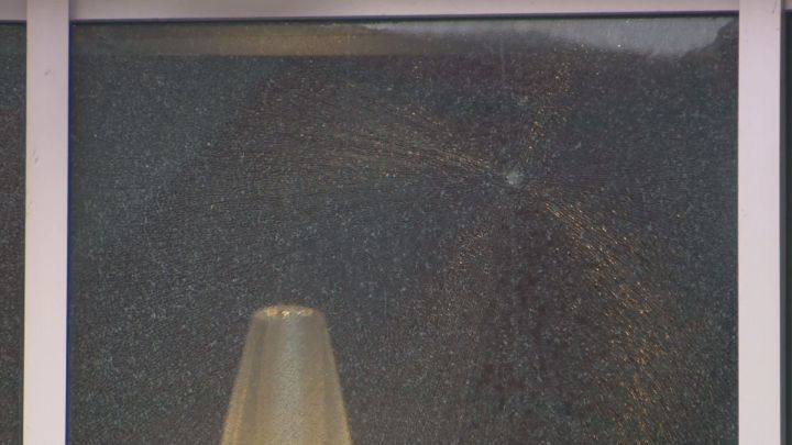 A window is damaged at the downtown Red Deer RCMP detachment after police say the building was shot at on Monday, March 14, 2016.