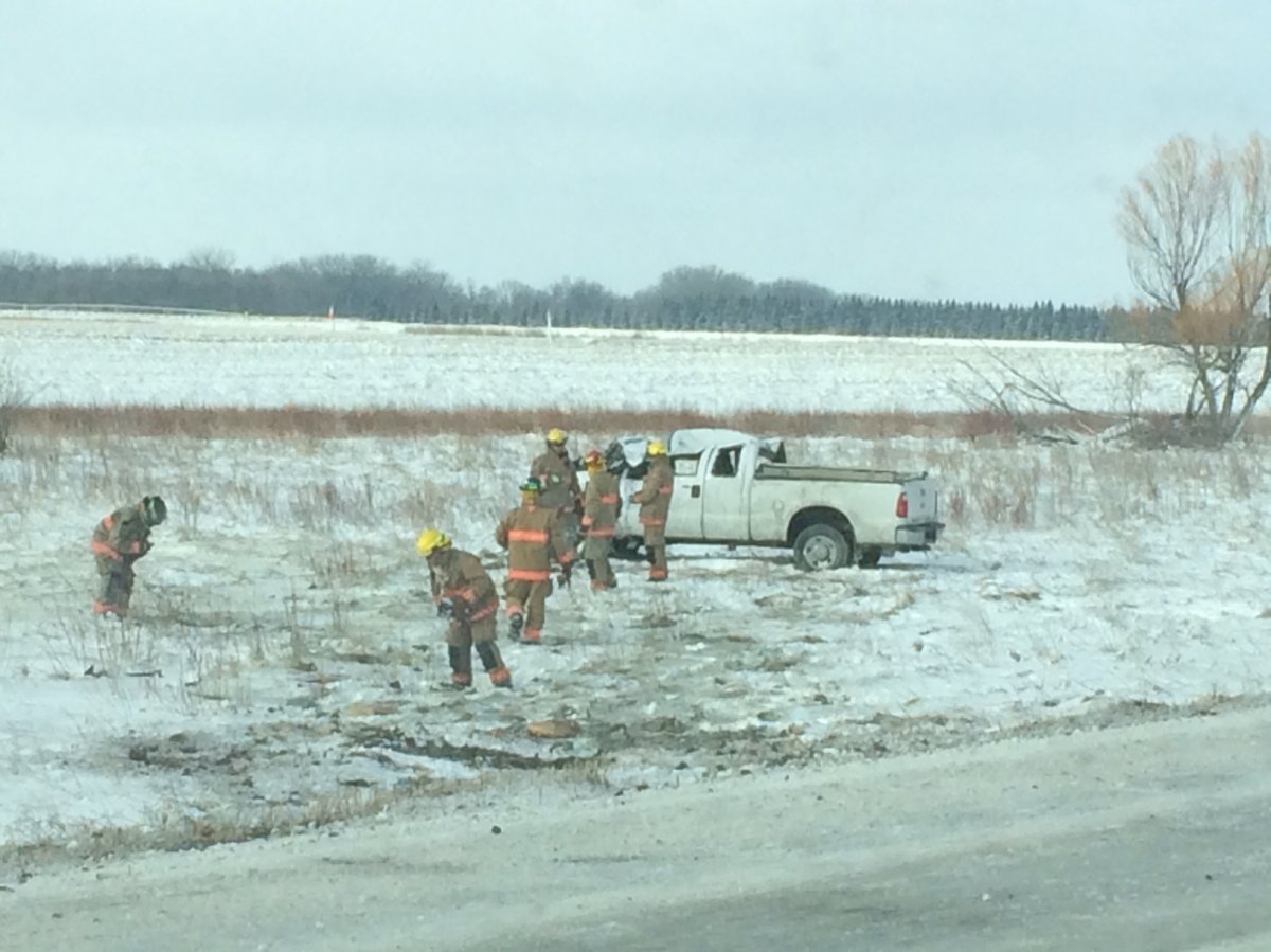 Traffic was at a stand still on Highway one near Portage La Prairie after a pickup truck rolled into the ditch Friday morning.