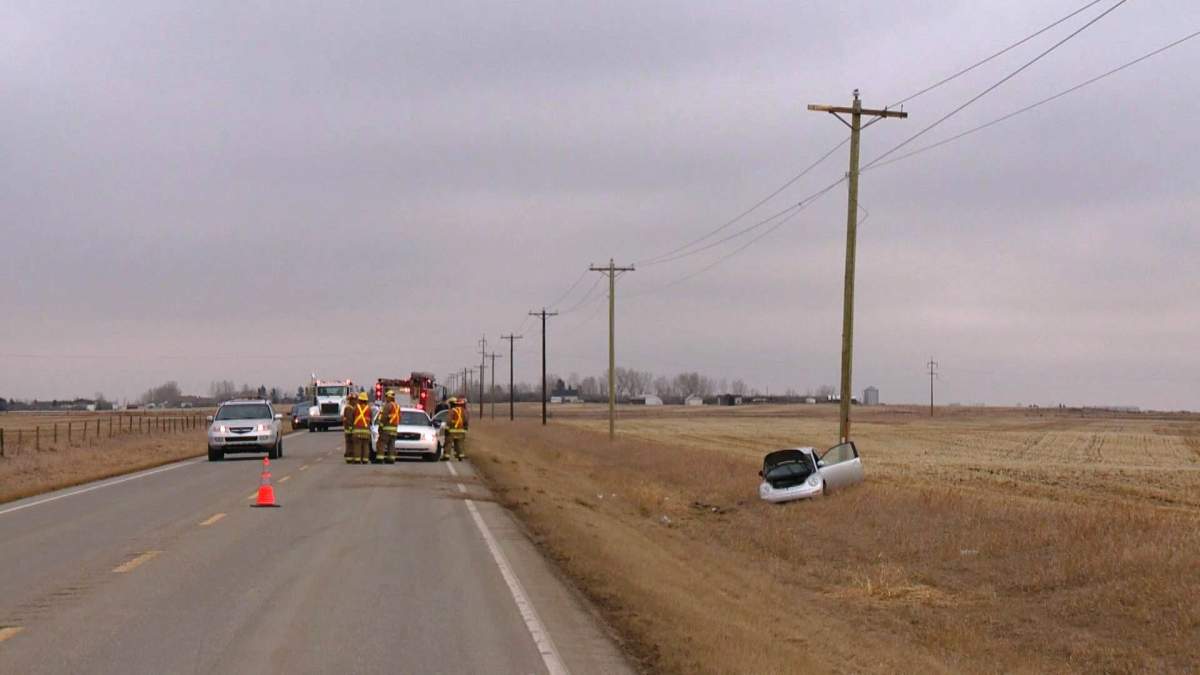 Emergency crews respond to a rollover on Highway 791 and Township Road 240, southeast of Chestermere, on Tuesday, March 22, 2016.