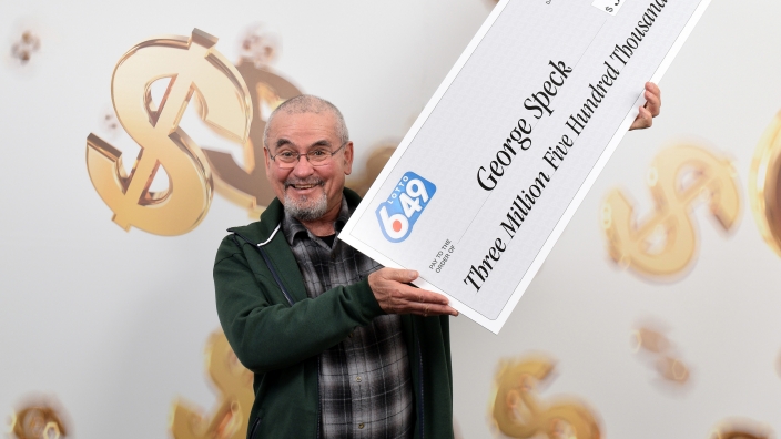 George Speck claims his lottery win.