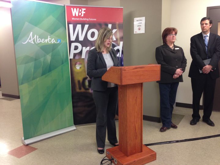 Stephanie McLean, minister of Status of Women, speaks to the media in Edmonton Monday, March 7, 2016.