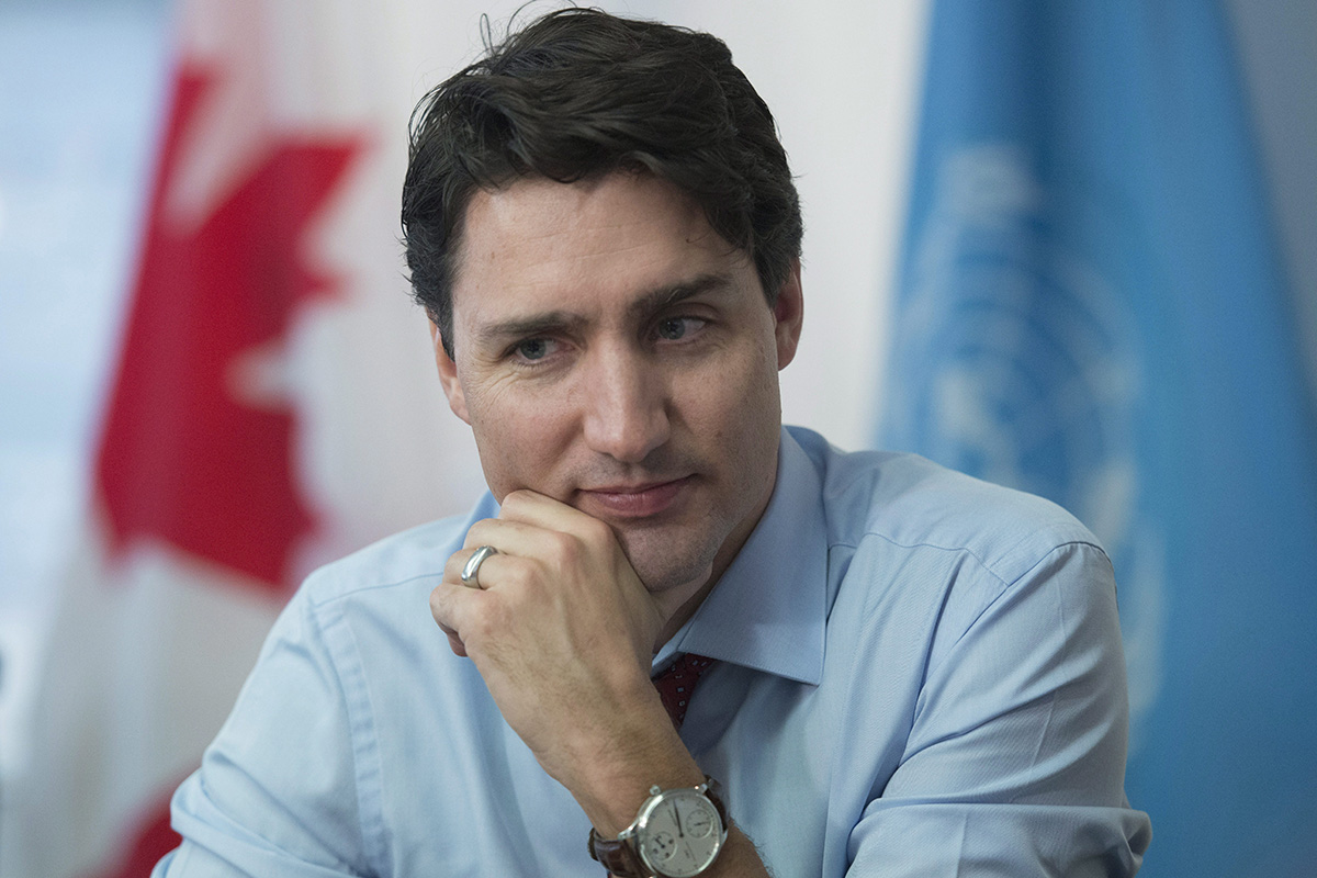 Canadian Prime Minister Justin Trudeau listens to the discussion as he takes part in a discussion on reaching the marginalized at a girls advocacy round table in New York, Wednesday March 16, 2016. 