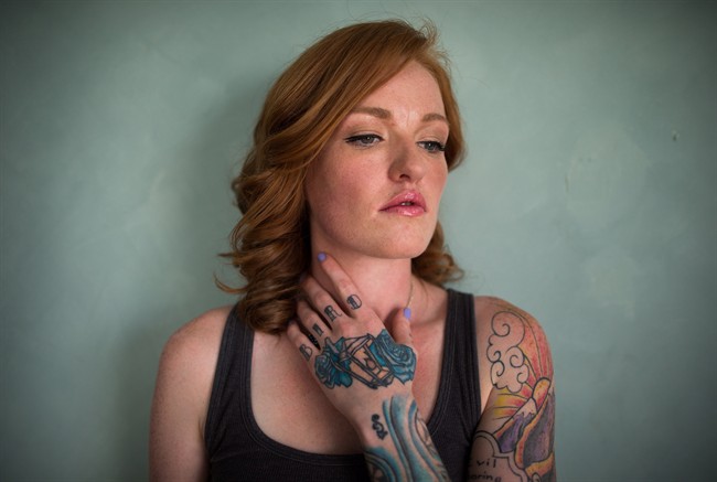 Tattoo artist transforms scars into empowerment - image
