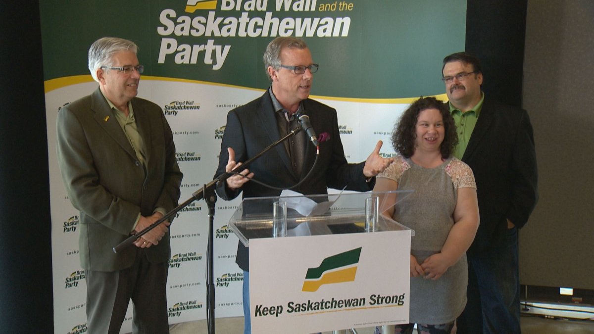 Sask Party Leader Brad Wall announces a pledge to allow home bakers, like Queen of Caramel Emmy Barr, to sell treats from home. 