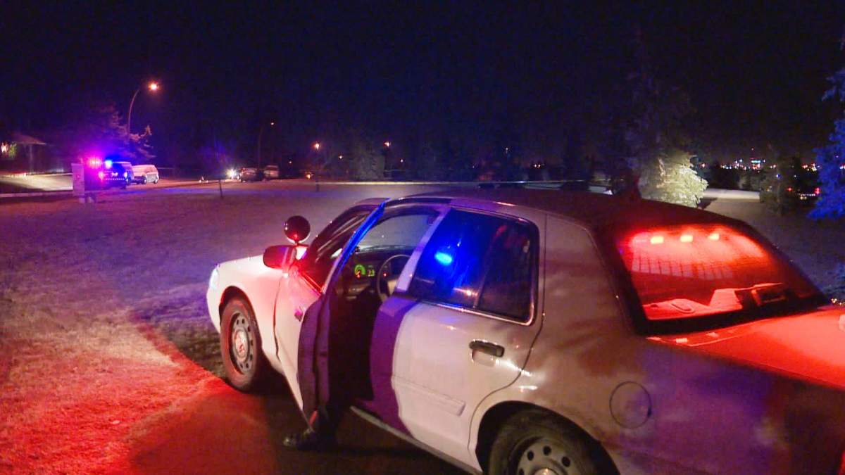Calgary police investigate a fatal shooting in the 100 block of Whiteview Road N.E. on Tuesday, March 1, 2016.