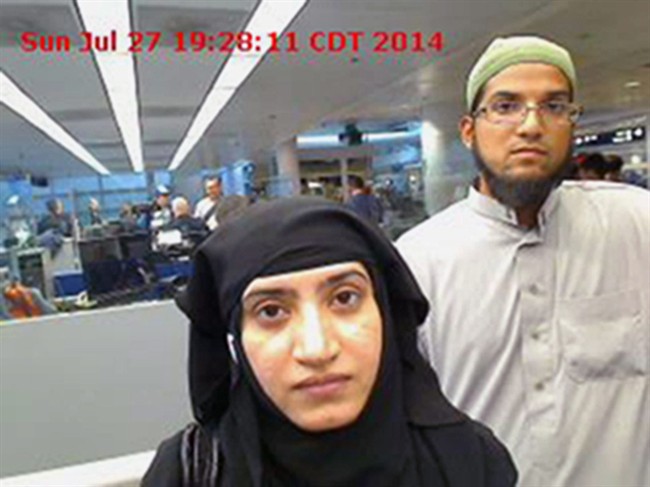 A photo provided by U.S. Customs and Border Protection shows Tashfeen Malik, left, and her husband, Syed Farook, at O'Hare International Airport in Chicago.