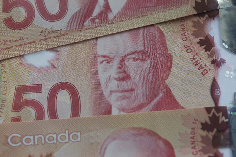 Tax evasion prosecutions fell by almost half across Canada in a three-year period, figures released by the federal justice department show. 