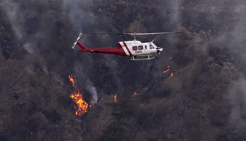 An unauthorized drone flying near last year's Testalinden Creek fire grounded eight helicopters and five planes for more than three hours, hampering firefighting efforts.