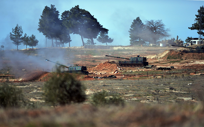 Turkish artillery fire from the border near Kilis town toward northern Syria, in Kilis, Turkey, Tuesday, Feb. 16, 2016. 