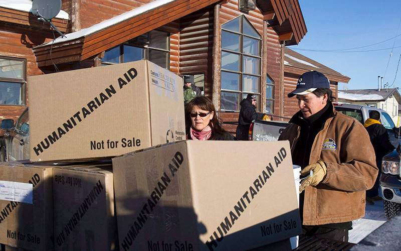 Humanitarian aid is unloaded in Attawapiskat, Ont. Teams of mental health workers have travelled to Attawapiskat to help the remote northern Ontario reserve contend with an epidemic of suicide attempts among its young people. 