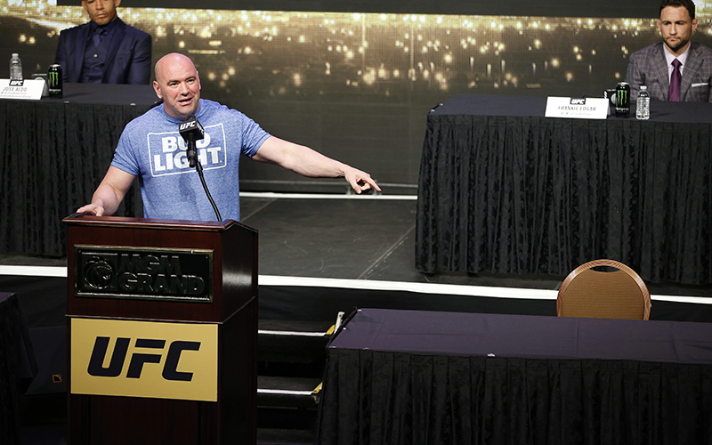 UFC president Dana White speaks beside an empty chair where Conor McGregor was supposed to sit during a news conference for UFC 200, Friday, April 22, 2016, in Las Vegas. 