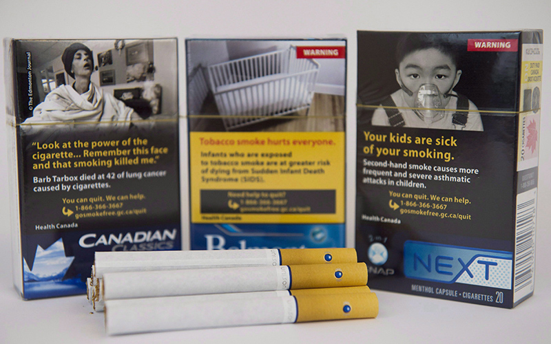 Cigarettes with a squeezable menthol capsule inside the filter are displayed in Toronto on November 18, 2015. 