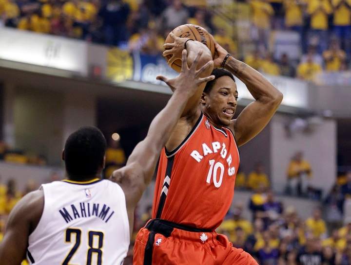 Toronto Raptors' DeMar DeRozan (10) passes against Indiana Pacers' Ian Mahinmi (28) during the first half of Game 6 of an NBA first-round playoff basketball series Friday, April 29, 2016, in Indianapolis.