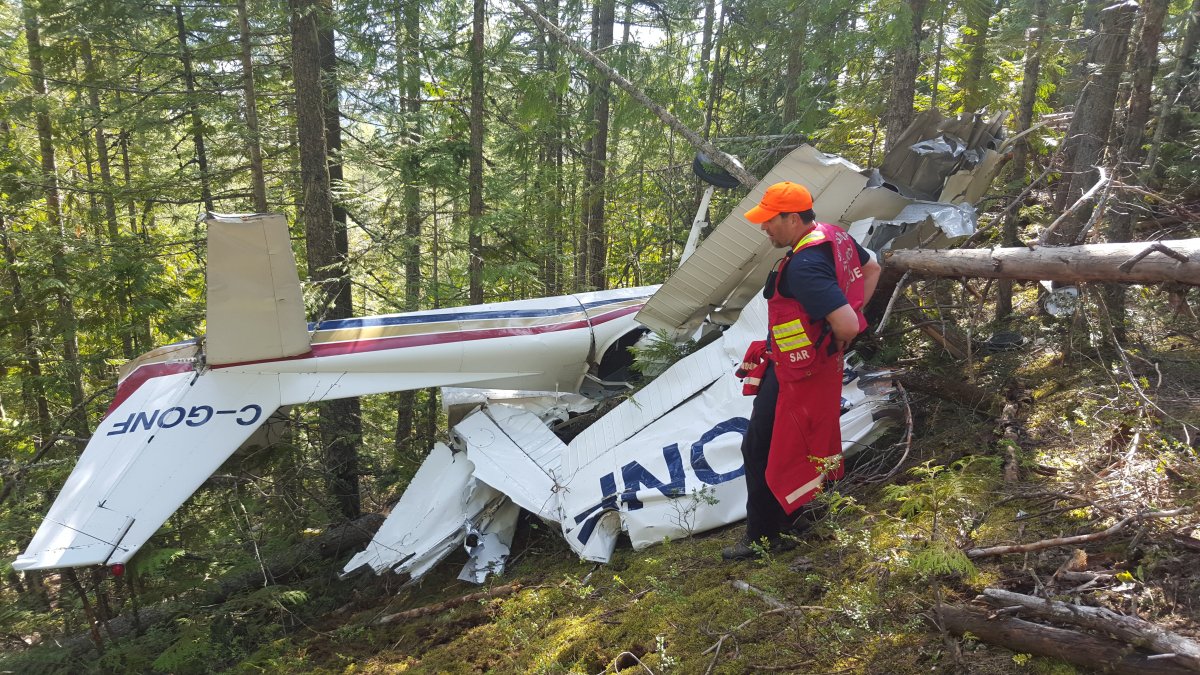 A member of Shuswap Search and Rescue goes back to the site of the plane crash on Mount Ida on Saturday morning to turn off the emergency beacon. 