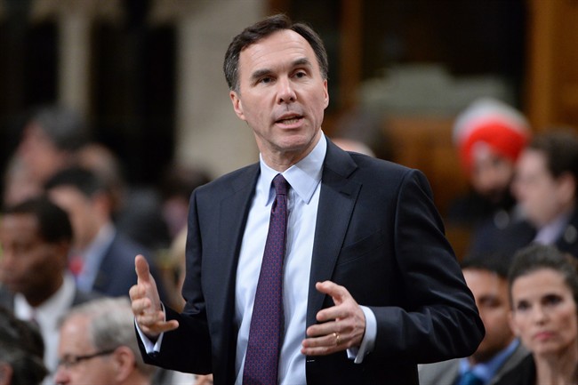 Finance Minister Bill Morneau predicts a deficit for the 2015-2016 fiscal year despite the current surplus.