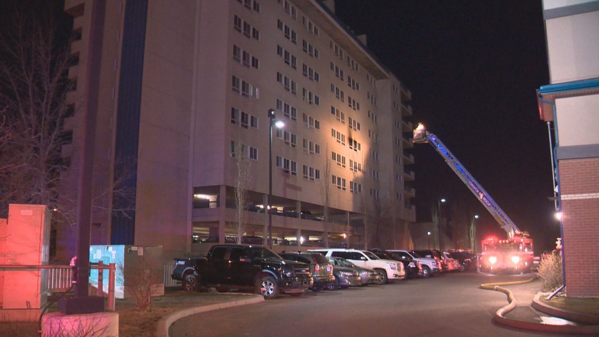 A person suffered serious injuries after jumping out of a sixth floor Edmonton apartment building to escape a fire, Sunday, April 3, 2016. 