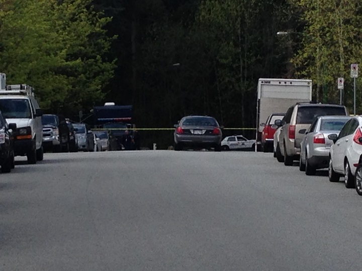 Police on the scene after a body was found in Burnaby on April 3, 2016.