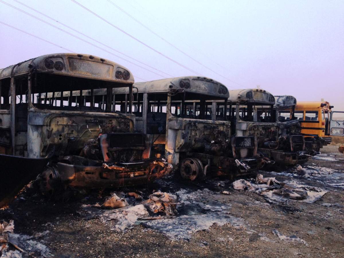 Several school buses in the area of 144 Avenue N.E. and 6 Street N.E. caught fire on Monday, April 25, 2016.