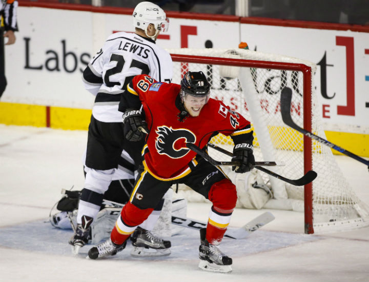 Calgary Flames' Hunter Shinkaruk celebrates his goal against the Los Angeles Kings during second period NHL hockey action in Calgary, Tuesday, April 5.