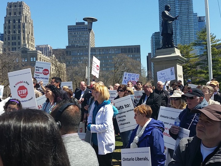Doctors rally over cuts after announcement that 500 doctors bill over $1M - image