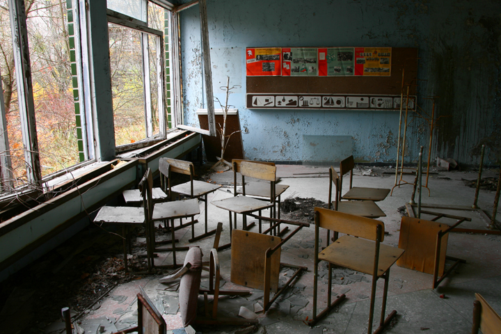 An abandoned classroom, complete with Soviet-era images of Lenin and slogans.