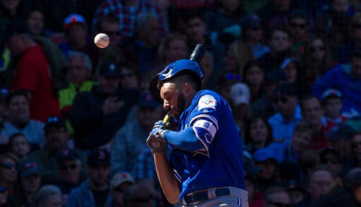 Toronto Blue Jays Chris Colabello is hit in the head by a pitch thrown by Steven Wright of the Boston Red Sox during the fourth inning at Fenway Park on April 17, 2016 in Boston, Massachusetts. 