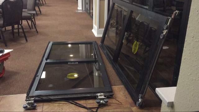 Church maintenance worker holds up robber at gunpoint following break-in - image
