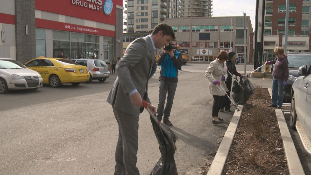 Mayor Don Iveson picks up litter during the City of Edmonton's Capital Clean Up initiative, Monday, April 4, 2016. 