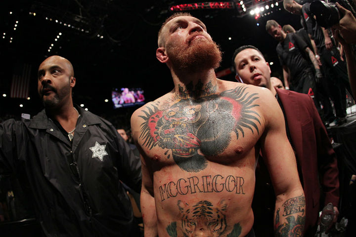 Conor McGregor exits the Octagon after his fight against Nate Diaz in their welterweight bout during the UFC 196 at the MGM Grand Garden Arena on March 5, 2016 in Las Vegas, Nevada.