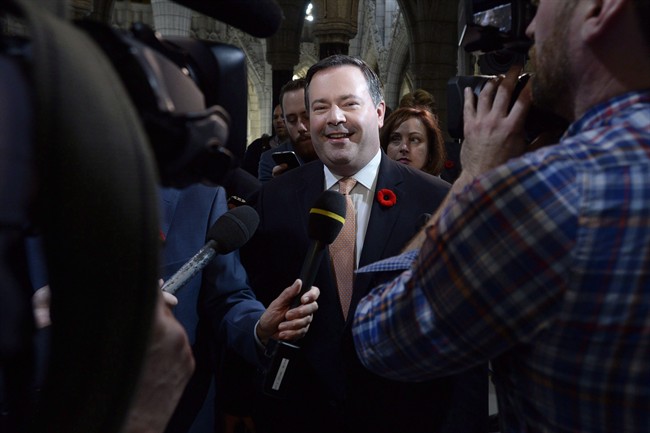 Conservative MP Jason Kenney arrives for a caucus meeting on Parliament Hill in .