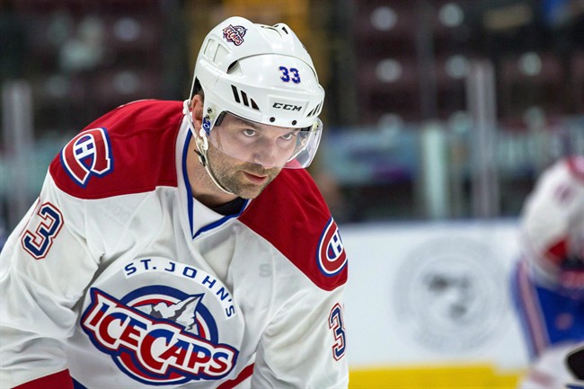 St. John's IceCaps John Scott is shown during an AHL game against Toronto in St. John's on Feb. 13, 2016. The Montreal Canadiens recalled forward John Scott from their American Hockey League affiliate on Sunday. The 33-year-old left winger created a buzz around the NHL when he was playfully voted in by fans as captain of the Pacific Division team for this year's all-star game.