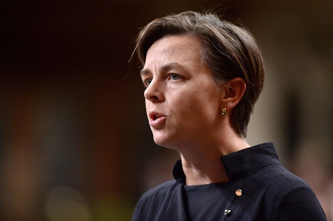 Kellie Leitch answers a question during Question Period in the House of Commons,.