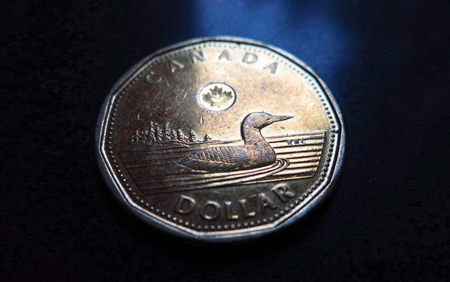 The loonie continued to plunge Wednesday morning, dropping another cent to about 77.6 cents US.