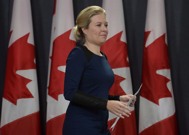 Conservative Member of Parliament Michelle Rempel arrives at a news conference about proposed government changes to immigration legislation, Thursday February 25, 2016 in Ottawa.