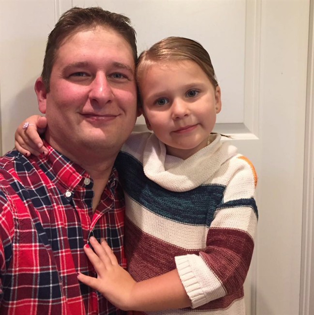 Only hours before the fire that killed her, a photo of Trent Butt and his daughter Quinn appeared on his Facebook page, her arm around his neck and her head resting against his.