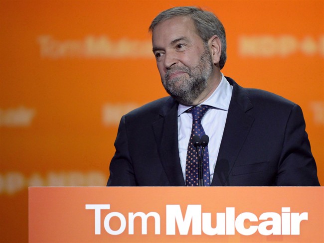 NDP Leader Tom Mulcair speaks to supporters on election night, Monday, Oct. 19, 2015 in Montreal. More than 1,500 NDP faithful are gathering in Edmonton today to spend the next three days sifting the ashes of last year's ballot-box disaster — and to confront the man many blame for it.