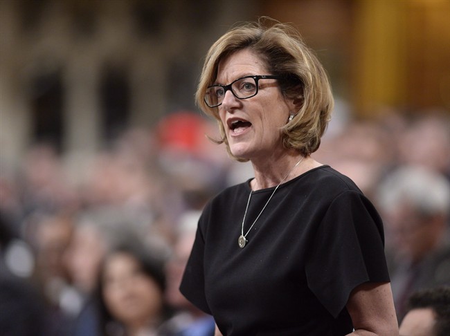 Pam Goldsmith-Jones, parliamentary secretary for foreign affairs, answers a question during Question Period in the House of Commons on Parliament Hill in Ottawa, on Monday, March 21, 2016. 